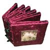 This mini-book is made of matboard cut into frames and covered in purple velvet. Beading was added on the spine, and along the front edge joins. It featurees sepia-toned close-up photos (mostly from near my house).