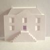 Detail view of the pop-up house and stairs.  The house folds down flat when the card is closed.
